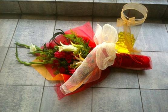 Hand Bouquet to Vase Floral Arrangement (assorted imported flowers)